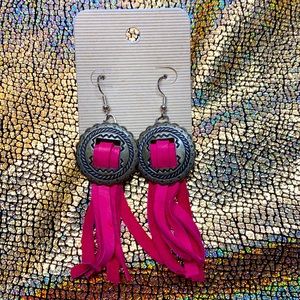 Pink leather earrings.